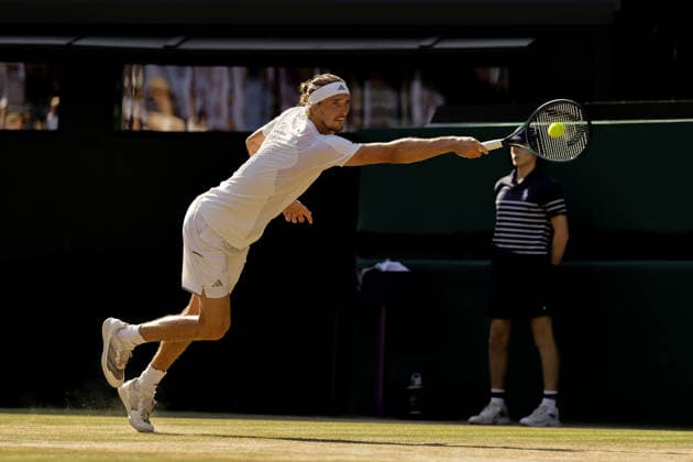 (260709) -- LONDON, July 9, 2026 -- Alexander Zverev of Germany returns the ball during the men s singles quarterfinal match against Taylor Fritz of the United States at the Wimbledon Tennis Championships in London, Britain, on July 8, 2026. (Photo by Xinhua) (SP)BRITAIN-LONDON-TENNIS-WIMBLEDON-MEN S SINGLES DinendraxHaria 