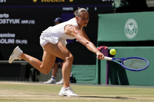 (260709) -- LONDON, July 9, 2026 -- Marta Kostyuk of Ukraine returns the ball during the women s singles quarterfinal match against Jasmine Paolini of Itlay at the Wimbledon Tennis Championships in London, Britain, on July 8, 2026. (Photo by Xinhua) (SP)BRITAIN-LONDON-TENNIS-WIMBLEDON-WOMEN S SINGLES DinendraxHaria 