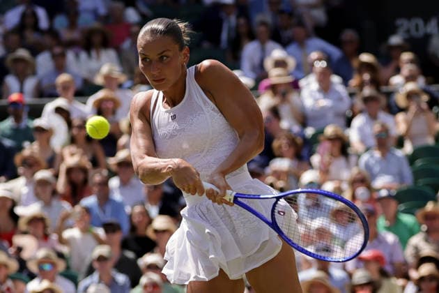 (260709) -- LONDON, July 9, 2026 -- Marta Kostyuk of Ukraine returns the ball during the women s singles quarterfinal match against Jasmine Paolini of Itlay at the Wimbledon Tennis Championships in London, Britain, on July 8, 2026. (Photo by Xinhua) (SP)BRITAIN-LONDON-TENNIS-WIMBLEDON-WOMEN S SINGLES DinendraxHaria 