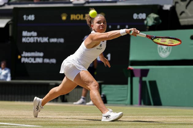 (260709) -- LONDON, July 9, 2026 -- Jasmine Paolini of Itlay returns the ball during the women s singles quarterfinal match against Marta Kostyuk of Ukraine at the Wimbledon Tennis Championships in London, Britain, on July 8, 2026. (Photo by Xinhua) (SP)BRITAIN-LONDON-TENNIS-WIMBLEDON-WOMEN S SINGLES DinendraxHaria 