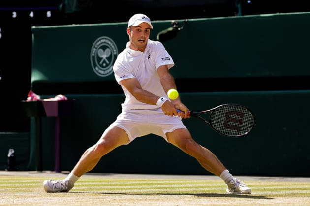 (260709) -- LONDON, July 9, 2026 -- Arthur Fery of Britain returns the ball during the men s singles quarterfinal match against Flavio Cobolli of Itlay at the Wimbledon Tennis Championships in London, Britain, on July 8, 2026. (Photo by Xinhua) (SP)BRITAIN-LONDON-TENNIS-WIMBLEDON-MEN S SINGLES DinendraxHaria 