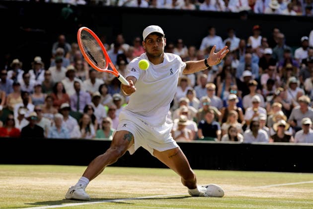 (260709) -- LONDON, July 9, 2026 -- Flavio Cobolli of Itlay returns the ball during the men s singles quarterfinal match against Arthur Fery of Britain at the Wimbledon Tennis Championships in London, Britain, on July 8, 2026. (Photo by Xinhua) (SP)BRITAIN-LONDON-TENNIS-WIMBLEDON-MEN S SINGLES DinendraxHaria 