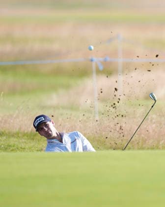 NORTH BERWICK, SCOTLAND - JULY 9: Alex Smalley plays from a bunker on the 11th green during Round 1 of the Genesis Scottish Open at the Renaissance Club, North Berwick on July 9, 2026 in North Berwick, Scotland Genesis Scottish Open Round 1