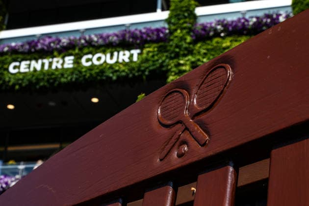 RECORD DATE NOT STATED 9th July 2026; All England Lawn Tennis and Croquet Club, London, England; Wimbledon Tennis Tournament, Day Eleven; Wimbledon Tennis logo on a bench in front of Centre Court JohnxPatrickxFletcher