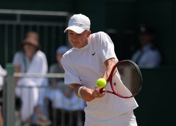 RECORD DATE NOT STATED 9th July 2026; All England Lawn Tennis and Croquet Club, London, England; Wimbledon Tennis Tournament, Day Eleven; Oliver Page (GBR) with a backhand shot to Thijs Boogaard (NED) JohnxPatrickxFletcher