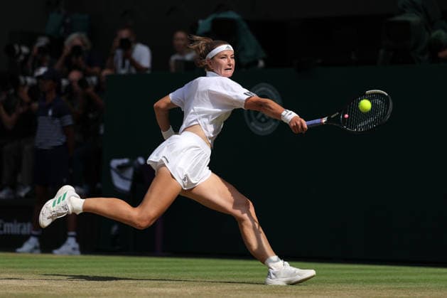 RECORD DATE NOT STATED 9th July 2026; All England Lawn Tennis and Croquet Club, London, England; Wimbledon Tennis Tournament, Day Eleven; Karolina Muchova (CZE) with a backhand shot to Coco Gauff (USA) JohnxPatrickxFletcher