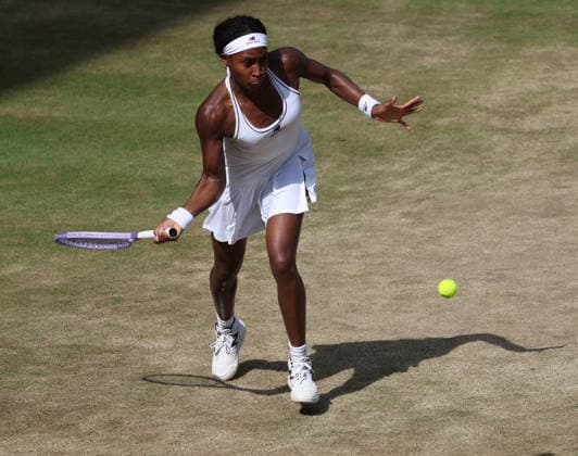 American Coco Gauff plays a forehand in her Women s Semi-Finals match against Czech Karolina Muchova on day Eleven of the 2026 Wimbledon Championships in London on Thursday, July 09,2026. Muchova won the match 6-2 1-6 7-6.  LON2026070914 HUGOxPHILPOTT