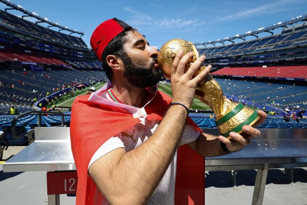 Moroccan fan kisses replica World Cup before the FIFA World Cup, WM, Weltmeisterschaft, Fussball 2026 Quarter Final match between France and Morocco at the Boston Stadium, Foxborough, Massachusetts on 9 July 2026. Copyright: xPeterxDovganx 45240011