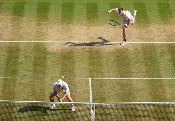 2026 Wimbledon, July 09, Semifinal LONDON, - JULY 9: Harri Heliovarra of Finland with Henry Patten of Great Britain plays a shot against Thanasi Kokkinakis of Australia and Aleksandar Kovacevic of the United States during the 2026 Wimbledon, July 09, Doubles Semifinal at The all England club, Wimbledon on July 9, 2026 in London, GBR. London The all England club, Wimbledon GBR Copyright: xPeterxvanxdenxBerg ISIxPhotosx 9478
