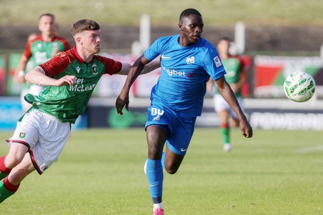 UEFA Europa Conference League First Qualifying Round First Leg, The Oval, Belfast 9 7 2026 Glentoran vs RFS Glentoran™s Jordan Jenkins with RFS™s Modou Saidy Jordan Jenkins with Modou Saidy 9 7 2026  Copyright: xx 090726JP3football001