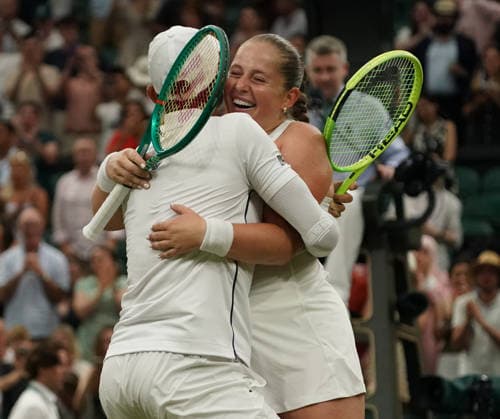 Tennis - 2026 Wimbledon Championships - Day Eleven (Week Two) - All England Lawn Tennis & Croquet Club, London - Thursday 8th July 2026 Centre Court : Mixed Doubles Final : Marc Polmans and Storm Hunter (AUS) v Marcelo Arevalo (ESA) and Jelena Ostapenko (LAT) Marcelo Arevalo (ESA) and Jelena Ostapenko (LAT) celebrate winning match point COLORSPORT ANDREW COWIE 
