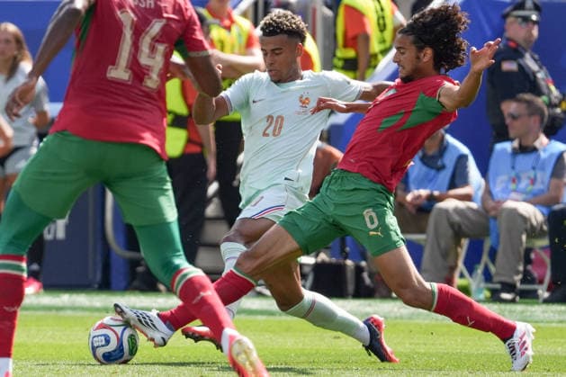 Désiré Doué (C) of France vies for the ball with Ayyoub Bouaddi of Morocco during a 2026 FIFA World Cup, WM, Weltmeisterschaft, Fussball quarterfinal match between France and Morocco at Gillette stadium in Foxborough, United States, 09 July 2026. FIFA World Cup 2026 quarterfinals - France vs. Morocco !ACHTUNG: NUR REDAKTIONELLE NUTZUNG!  Copyright: xÁngelxColmenaresx GR4074 20260709-55020851863_1