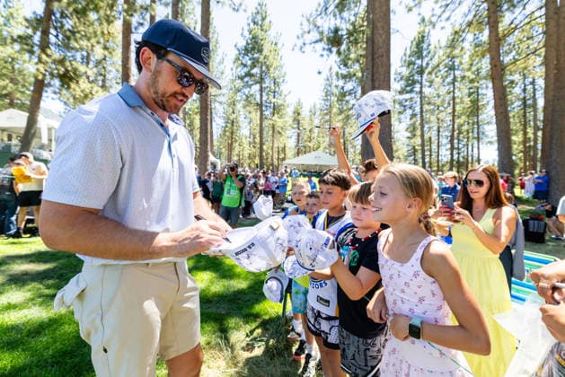 STATELINE, NV - JULY 09: Miles Teller signs autographs during the preview round of the American Century Championship on July 9, 2026 at Edgewood Tahoe Golf Course in Stateline, NV. (Photo by Matthew Huang Icon Sportswire) GOLF: JUL 09 American Century Championship EDITORIAL USE ONLY Icon260709097