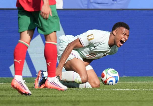 260710 -- BOSTON, July 10, 2026 -- Kylian Mbappe of France falls down during the quarter final match between France and Morocco at the 2026 FIFA World Cup, WM, Weltmeisterschaft, Fussball at Boston Stadium in Boston, the United States, July 9, 2026. SPU.S.-BOSTON-FOOTBALL-FIFA WORLD CUP-QUARTER FINAL-FRA VS MAR LuixSiuxWai  (SP)U.S.-BOSTON-FOOTBALL-FIFA WORLD CUP-QUARTER FINAL-FRA VS MAR IMAGO LuixSiuxWai  imago images 0861209995