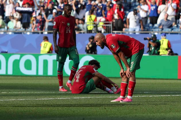(260710) -- BOSTON, July 10, 2026 -- Players of Morocco react after the quarter final match between France and Morocco at the 2026 FIFA World Cup, WM, Weltmeisterschaft, Fussball at Boston Stadium in Boston, the United States, July 9, 2026. ) (SP)U.S.-BOSTON-FOOTBALL-FIFA WORLD CUP-QUARTER FINAL-FRA VS MAR XuxZijian 