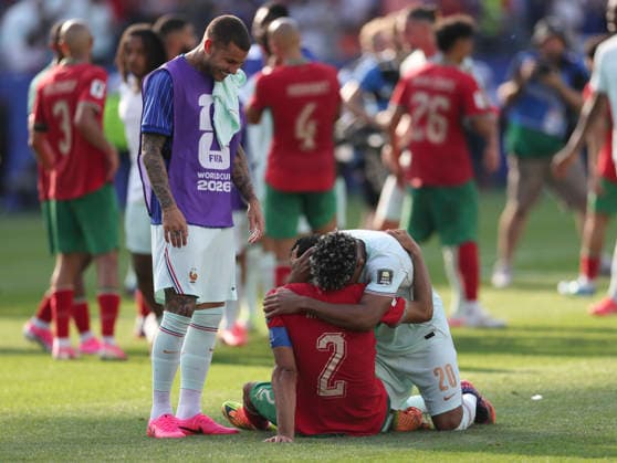 (260710) -- BOSTON, July 10, 2026 -- Desire Doue (R) of France hugs Achraf Hakimi (C) of Morocco after the quarter final match between France and Morocco at the 2026 FIFA World Cup, WM, Weltmeisterschaft, Fussball at Boston Stadium in Boston, the United States, July 9, 2026. ) (SP)U.S.-BOSTON-FOOTBALL-FIFA WORLD CUP-QUARTER FINAL-FRA VS MAR HuxXingyu 
