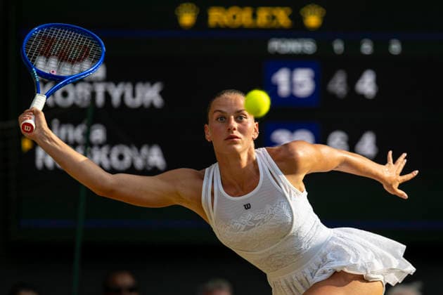 (260710) -- LONDON, July 10, 2026 -- Marta Kostyuk of Ukraine hits a return during the women s semifinal match against Linda Noskova of the Czech Republic at the Wimbledon Tennis Championships in London, Britain, on July 9, 2026. (Photo by Xinhua) (SP)BRITAIN-LONDON-TENNIS-WIMBLEDON-WOMEN S SINGLES StephenxChung 