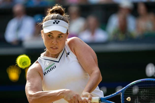 (260710) -- LONDON, July 10, 2026 -- Linda Noskova of the Czech Republic hits a return during the women s semifinal match against Marta Kostyuk of Ukraine at the Wimbledon Tennis Championships in London, Britain, on July 9, 2026. (Photo by Xinhua) (SP)BRITAIN-LONDON-TENNIS-WIMBLEDON-WOMEN S SINGLES StephenxChung 