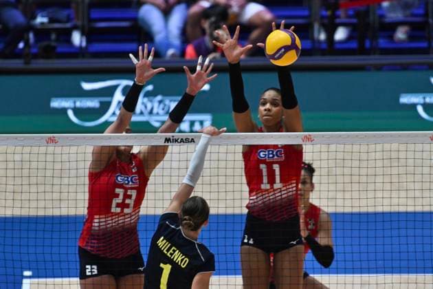 RECORD DATE NOT STATED HONG KONG-SPORTS Volleyball Nations League Hong Kong Gaila Gonzalez (No.23) and Geraldine Gonzalez (No.11) from team Dominican Republic during the match between Dominican Republic and Ukraine at Volleyball Nations League Hong Kong 2026 in Hong Kong, July 10, 2026.NEXPHER Kobe Li Hong Kong