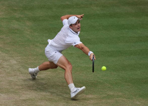 RECORD DATE NOT STATED 10th July 2026; All England Lawn Tennis and Croquet Club, London, England; Wimbledon Tennis Tournament, Day Twelve; Arthur Fery (GBR) with a backhand shot to Alexander Zverev (GER) JohnxPatrickxFletcher