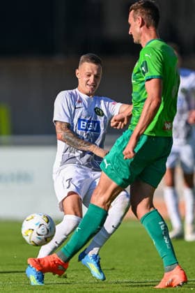 SOCCER - Wattens vs Zhytomyr, test match SCHWAZ,AUSTRIA,10.JUL.26 - SOCCER - ADMIRAL Bundesliga, Premier League, WSG Tirol vs FC Polissya Zhytomyr, test match. Image shows Oleksandr Nazarenko (Zhytomyr) and David Gugganig (Wattens).  GEPAxpictures xDanielxSchoenherr