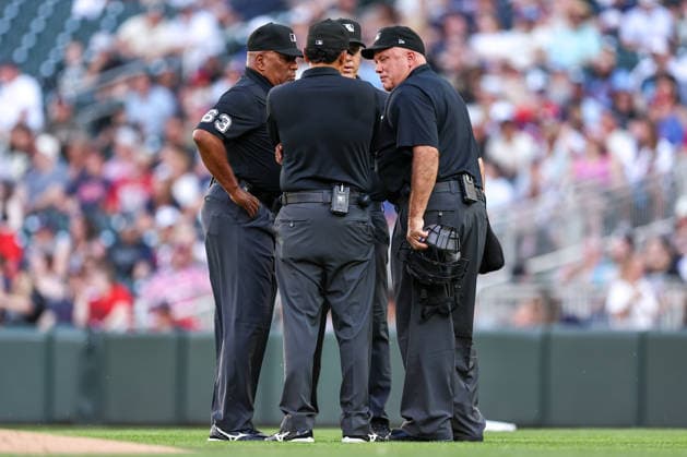 July 10th, 2026: The umpires gather to discuss a foul ball call in the first inning during a MLB, Baseball Herren, USA Baseball game between the Los Angeles Angels and the Minnesota Twins at Target Field in Minneapolis, Minnesota. CSM Minneapolis USA - ZUMAc04_ 20260710_zma_c04_050 Copyright: xStevenxGarciax