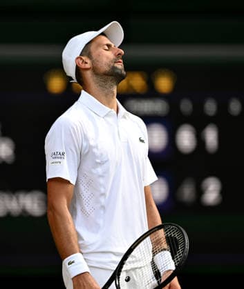 (260711) -- LONDON, July 11, 2026 -- Novak Djokovic reacts during the men s singles semifinal between Jannik Sinner of Italy and Novak Djokovic of Serbia at the Wimbledon Tennis Championships in London, Britain, on July 10, 2026. ) (SP)BRITAIN-LONDON-TENNIS-WIMBLEDON-MEN S SINGLES LixYing 