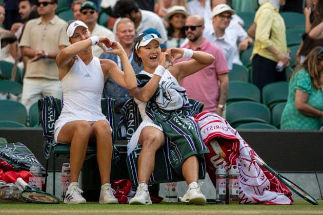 (260711) -- LONDON, July 11, 2026 -- Guo Hanyu (R) Kristina Mladenovic celebrate winning the women s doubles semi-finals match between Guo Hanyu (China) Kristina Mladenovic (France) and Jiang Xinyu Xu Yifan of China at the Wimbledon Tennis Championships in London, Britain, on July 10, 2026. (Photo by Xinhua) (SP)BRITAIN-LONDON-TENNIS-WIMBLEDON-WOMEN S DOUBLES StephenxChung 