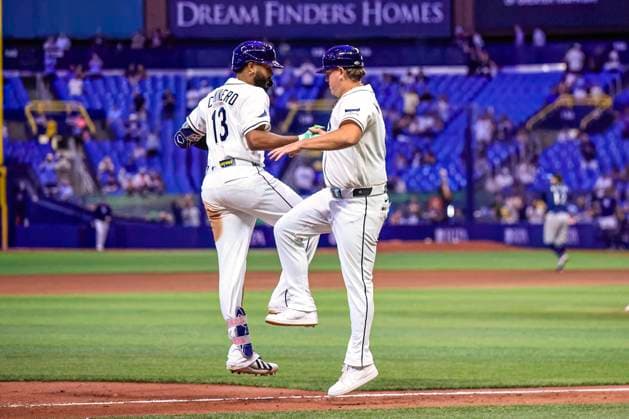 July 10, 2026, St. Petersburg, Florida, USA: Tampa Bay Rays third baseman Junior Caminero (13) celebrates his home run with third base coach Brady Williams (4) during an MLB, Baseball Herren, USA game against the Seattle Mariners on July 10, 2026 at Tropicana Field. The Rays beat the Mariners 7-2. St. Petersburg USA - ZUMAh180 20260710_zsp_h180_055 Copyright: xKimxHukarix
