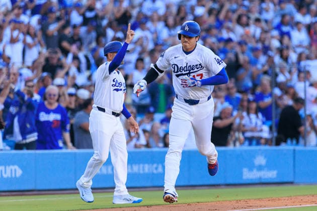 July 10, 2026, Los Angeles, California, USA: Shohei Ohtani 17 of the Los Angeles Dodgers is congratulated by third base coach, Dino Ebel after hitting a solo home run in the first inning in a regular season MLB, Baseball Herren, USA game against the Arizona Diamondbacks on Friday July 10, 2026 at Dodger Stadium in Los Angeles, California. Dodgers lose to Diamondbacks, 3-9. JAVIER ROJAS PI Los Angeles USA - ZUMAp124 20260710_zaa_p124_023 Copyright: xJavierxRojasx