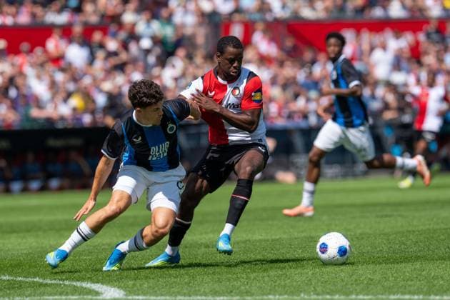 ROTTERDAM, 11-07-2026, Stadium Feijenoord de Kuip , Pre-season friendly Feyenoord - Club Brugge , Season 2026 2027 , Picture shows Club Brugge Player Kyriani Sabbe and Feyenoord player Jordan Lotomba Feyenoord - Club Brugge  x204976342x Copyright:
