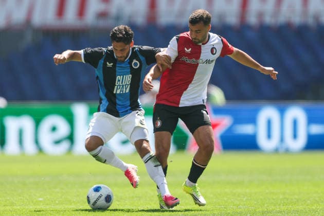 2026-07-11 Feyenoord v Club Brugge - Pre Season Friendly ROTTERDAM, NETHERLANDS - JULY 11: Ludovit Reis of Club Brugge is challenged by Charles Vanhoutte of Feyenoord during the Pre Season Friendly match between Feyenoord and Club Brugge at Stadion Feijenoord on July 11, 2026 in Rotterdam, Netherlands. Rotterdam Stadion Feijenoord Netherlands Content not available for redistribution in The Netherlands directly or indirectly through any third parties. Copyright: xHansxvanxderxValkx