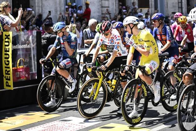 Belgian Tim Merlier of Soudal Quick-Step, Danish Jonas Vingegaard of Team Visma-Lease a Bike and Slovenian Tadej Pogacar of UAE Team Emirates XRG pictured at the start of stage 8 of the 2026 Tour de France cycling race, a stage of 182km from Perigueux to Bergerac, on Saturday 11 July 2026. The 113th edition of the Tour de France starts on Saturday 4 July in Barcelona, Spain, and will finish in Paris, France on the 26th of July. JASPERxJACOBS  x180928296x