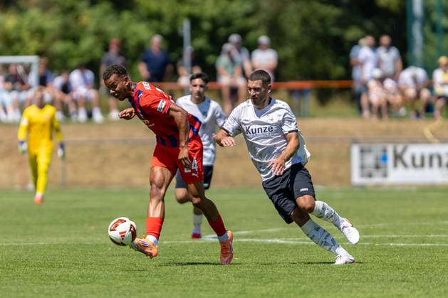 Zweikampf Marcel Costly (FC Heidenheim, 24) Felix Lutz (SGM Langenau, 08), GER, SGM Langenau vs. 1.FC Heidenheim, Fussball, Testspiel, Saison 2026 2027, 11.07.2026, DFL DFB REGULATIONS PROHIBIT ANY USE OF PHOTOGRAPHS AS IMAGE SEQUENCES AND OR QUASI-VIDEO, GER, SGM Langenau vs. 1.FC Heidenheim, Fussball, Testspiel, Saison 2026 2027, 11.07.2026 Langenau *** Tackle: Marcel Costly (FC Heidenheim) vs. Felix Lutz (SGM Langenau), 08, GER, SGM Langenau vs. 1 FC Heidenheim, Soccer, Friendly Match, 2026–2027 Season, July 11, 2026, DFL and DFB regulations prohibit any use of photographs as image sequences and or quasi-video, GER, SGM Langenau vs. 1 FC Heidenheim, soccer, friendly match, 2026–2027 season, July 11, 2026, Langenau Copyright: xEibner-Pressefoto JanixPlessx EP_JPL