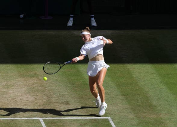 RECORD DATE NOT STATED 11th July 2026; All England Lawn Tennis and Croquet Club, London, England; Wimbledon Tennis Tournament, Day Thirteen; Karolina Muchova (CZE) with a forehand shot to Linda Noskova (CZE) JohnxPatrickxFletcher