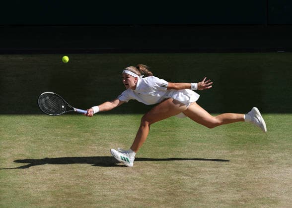 RECORD DATE NOT STATED 11th July 2026; All England Lawn Tennis and Croquet Club, London, England; Wimbledon Tennis Tournament, Day Thirteen; Karolina Muchova (CZE) stretches to play a forehand shot to Linda Noskova (CZE) JohnxPatrickxFletcher
