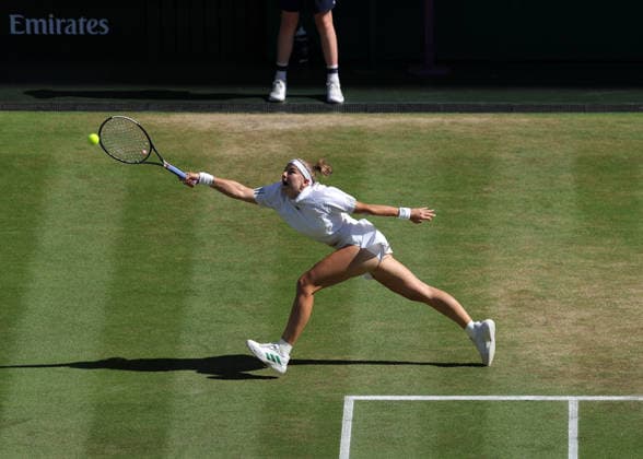 RECORD DATE NOT STATED 11th July 2026; All England Lawn Tennis and Croquet Club, London, England; Wimbledon Tennis Tournament, Day Thirteen; Karolina Muchova (CZE) with a forehand shot to Linda Noskova (CZE) JohnxPatrickxFletcher