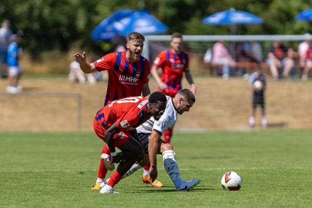 Foulspiel von Felix Lutz (SGM Langenau, 08) gegen Christian Conteh (FC Heidenheim, 10) Schmerz Emotionen dahinter Julian Niehues (FC Heidenheim, 16), GER, SGM Langenau vs. 1.FC Heidenheim, Fussball, Testspiel, Saison 2026 2027, 11.07.2026, DFL DFB REGULATIONS PROHIBIT ANY USE OF PHOTOGRAPHS AS IMAGE SEQUENCES AND OR QUASI-VIDEO, GER, SGM Langenau vs. 1.FC Heidenheim, Fussball, Testspiel, Saison 2026 2027, 11.07.2026 Langenau *** Foul by Felix Lutz (SGM Langenau, 08) against Christian Conteh (FC Heidenheim, 10); the pain and emotion behind it: Julian Niehues (FC Heidenheim, 16), GER, SGM Langenau vs. 1 FC Heidenheim, soccer, friendly match, 2026–2027 season, July 11, 2026, DFL and DFB regulations prohibit any use of photographs as image sequences and or quasi-video, GER, SGM Langenau vs. 1 FC Heidenheim, soccer, friendly match, 2026–2027 season, July 11, 2026, Langenau Copyright: xEibner-Pressefoto JanixPlessx EP_JPL