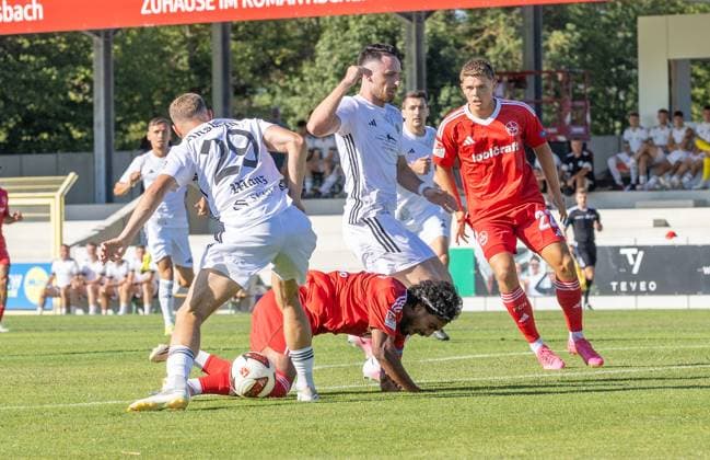 11.07.2026 - Fussball - Saison 2026 2027 - Testspiel Freundschaftsspiel Vorbereitungsspiel: SpVgg Ansbach 09 - 1. FC Nürnberg Nuernberg FCN ( Club ) - Sportfoto Zink DaMa - xdaxmax - Riko Manz (29, SpVgg Ansbach ) foult Rayan Ghrieb (7, 1. FC Nürnberg FCN ) zum Elfmeter *** July 11, 2026 Soccer Season 2026–2027 Exhibition Match Friendly Match Preseason Match SpVgg Ansbach 09 vs. 1 FC Nürnberg (Nürnberg FCN) Club Sports Photo Zink DaMa xdaxmax Riko Manz 29, SpVgg Ansbach fouls Rayan Ghrieb 7, 1 FC Nürnberg (FCN) is awarded a penalty kick