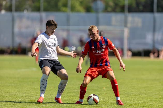 Zweikampf Luka Janes (FC Heidenheim, 36) Nils Koros (SGM Langenau, 26), GER, SGM Langenau vs. 1.FC Heidenheim, Fussball, Testspiel, Saison 2026 2027, 11.07.2026, DFL DFB REGULATIONS PROHIBIT ANY USE OF PHOTOGRAPHS AS IMAGE SEQUENCES AND OR QUASI-VIDEO, GER, SGM Langenau vs. 1.FC Heidenheim, Fussball, Testspiel, Saison 2026 2027, 11.07.2026 Langenau *** Head-to-head: Luka Janes (FC Heidenheim), 36; Nils Koros (SGM Langenau), 26, GER, SGM Langenau vs. 1 FC Heidenheim, Soccer, Friendly, 2026–2027 Season, July 11, 2026, DFL and DFB regulations prohibit any use of photographs as image sequences and or quasi-video, GER, SGM Langenau vs. 1 FC Heidenheim, soccer, friendly match, 2026–2027 season, July 11, 2026, Langenau Copyright: xEibner-Pressefoto JanixPlessx EP_JPL