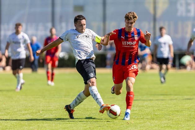 Harter Zweikampf Pascal Spaeth (SGM Langenau, 14) Yannik Wagner (FC Heidenheim, 38), GER, SGM Langenau vs. 1.FC Heidenheim, Fussball, Testspiel, Saison 2026 2027, 11.07.2026, DFL DFB REGULATIONS PROHIBIT ANY USE OF PHOTOGRAPHS AS IMAGE SEQUENCES AND OR QUASI-VIDEO, GER, SGM Langenau vs. 1.FC Heidenheim, Fussball, Testspiel, Saison 2026 2027, 11.07.2026 Langenau *** Tough Tackle: Pascal Spaeth (SGM Langenau), 14; Yannik Wagner (FC Heidenheim), 38, GER; SGM Langenau vs. 1 FC Heidenheim, Soccer, Friendly Match, 2026–2027 Season, July 11, 2026, DFL and DFB regulations prohibit any use of photographs as image sequences and or quasi-video, GER, SGM Langenau vs. 1 FC Heidenheim, soccer, friendly match, 2026–2027 season, July 11, 2026, Langenau Copyright: xEibner-Pressefoto JanixPlessx EP_JPL
