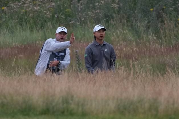 UK: The Genesis Scottish Open at The Renaissance Club, North Berwick, Scotland on 11 July 2026: Pictured: Min Woo Lee (Australia) and his caddie Shane Joel in the rough on the 1st fairway during the third round of the Genesis Scottish Open Championship 2026 North Berwick The Renaissance Club Scotland Scotland Copyright: xAlexxToddx