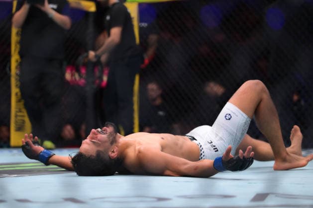 July 11, 2026, Las Vegas, Nevada, USA: ADRIAN YANEZ (C) in the ground celebrating after defeated CODY GARBRANDT (not in picture) by TKO (strikes) at 2:47 of Round 1 during UFC 329 at the T-Mobile Arena in Las Vegas. Las Vegas USA - ZUMAo117 20260711_zsp_o117_048 Copyright: xMikaelxOnax