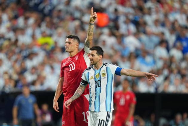 Argentina v Switzerland - FIFA World Cup, WM, Weltmeisterschaft, Fussball 2026 - Quarter Finals KANSAS CITY, UNITED STATES - JULY 11: Lionel Messi of Argentina and Granit Xhaka (L) of Switzerland during the 2026 FIFA World Cup quarter-final match between Argentina and Switzerland at Arrowhead Stadium in Kansas City, Missouri, US, on July 11, 2026. Ercin Erturk Anadolu Kansas City United States. Editorial use only. Please get in touch for any other usage.  Copyright: x2026xAnadoluxErcinxErturkx