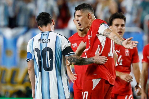 FIFA World Cup, WM, Weltmeisterschaft, Fussball 2026 quarterfinals - Argentina vs Switzerland Argentina s Lionel Messi (L) talks with Switzerland s Granit Xhaka (R) during the FIFA World Cup 2026 quarterfinals match Argentina vs Switzerland, in Kansas City, Missouri, USA, 11 July 2026. Kansas City United States  Copyright: xPETERxKLAUNZERx