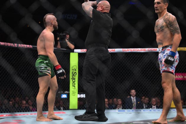 July 11, 2026, Las Vegas, Nevada, USA: Referee wave out MAX HOLLOWAY defeated CONOR MCGREGOR by TKO (knee injury) at 1:09 of Round 1 during UFC 329 at the T-Mobile Arena in Las Vegas. UFC 329: Max Holloway Defeated Conor McGregor By TKO  - ZUMAo117 20260711_zsp_o117_086 Copyright: xMikaelxOnax