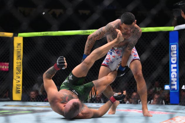 July 11, 2026, Las Vegas, Nevada, USA: MAX HOLLOWAY (top) defeated CONOR MCGREGOR (bottom) by TKO (knee injury) at 1:09 of Round 1 during UFC 329 at the T-Mobile Arena in Las Vegas. UFC 329: Max Holloway Defeated Conor McGregor By TKO  - ZUMAo117 20260711_zsp_o117_090 Copyright: xMikaelxOnax