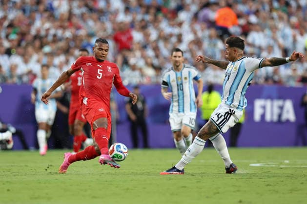 KANSAS CITY, MO - JULY 11: Manuel Akanji 5 of Switzerland clears a ball past Enzo Fernandez 24 of Argentina in the first half of the FIFA World Cup, WM, Weltmeisterschaft, Fussball 2026 Quarterfinal match between Argentina and Switzerland on July 11, 2026 at Kansas City Stadium in Kansas City, MO. (Photo by Scott Winters Icon Sportswire) SOCCER: JUL 11 FIFA World Cup 26 Quarter-Final - Argentina v Switzerland EDITORIAL USE ONLY Icon2607110609