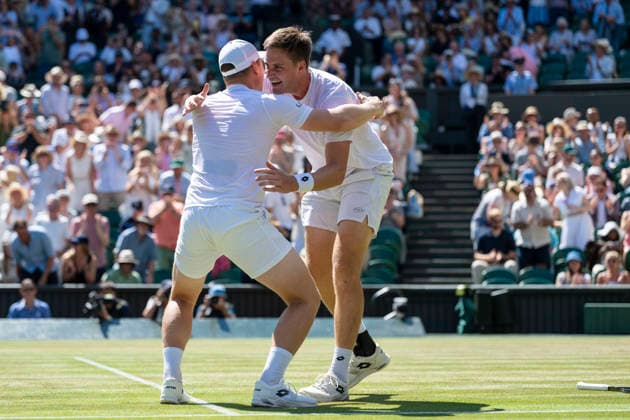 (260712) -- LONDON, July 12, 2026 -- Harri Heliovaara (L) Henry Patten celebrate winning the men s doubles final match between Harri Heliovaara (Finland) Henry Patten (Britain) and Marcelo Arevalo (El Salvador) Mate Pavic (Croatia) at the Wimbledon Tennis Championships in London, Britain, on July 11, 2026. (Photo by Xinhua) (SP)BRITAIN-LONDON-TENNIS-WIMBLEDON-MEN S DOUBLES StephenxChung 