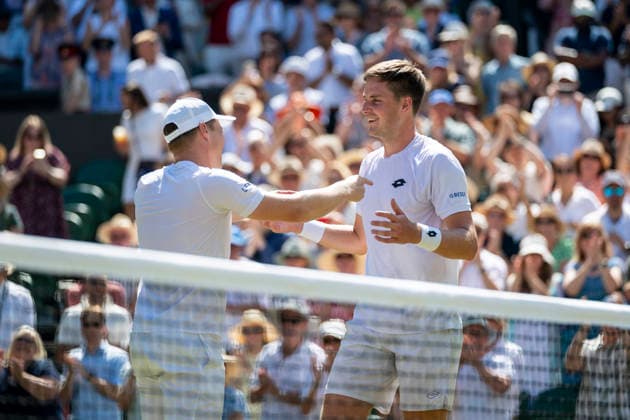 (260712) -- LONDON, July 12, 2026 -- Harri Heliovaara Henry Patten (R) celebrate winning the men s doubles final match between Harri Heliovaara (Finland) Henry Patten (Britain) and Marcelo Arevalo (El Salvador) Mate Pavic (Croatia) at the Wimbledon Tennis Championships in London, Britain, on July 11, 2026. (Photo by Xinhua) (SP)BRITAIN-LONDON-TENNIS-WIMBLEDON-MEN S DOUBLES StephenxChung 